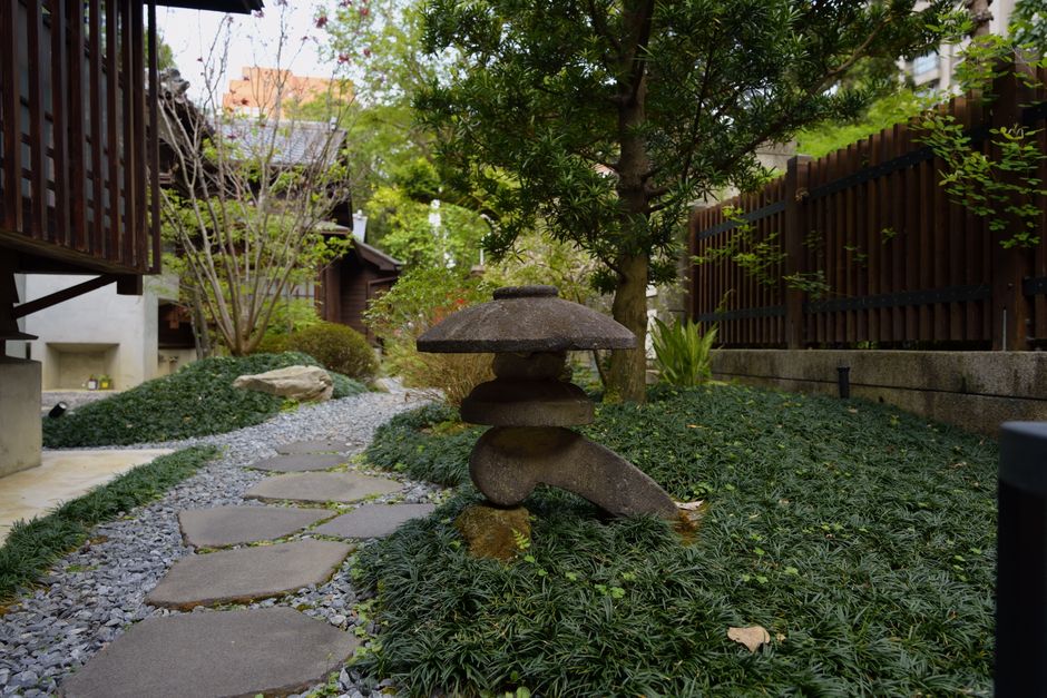 Beautiful stone garden pathway winding through native plants